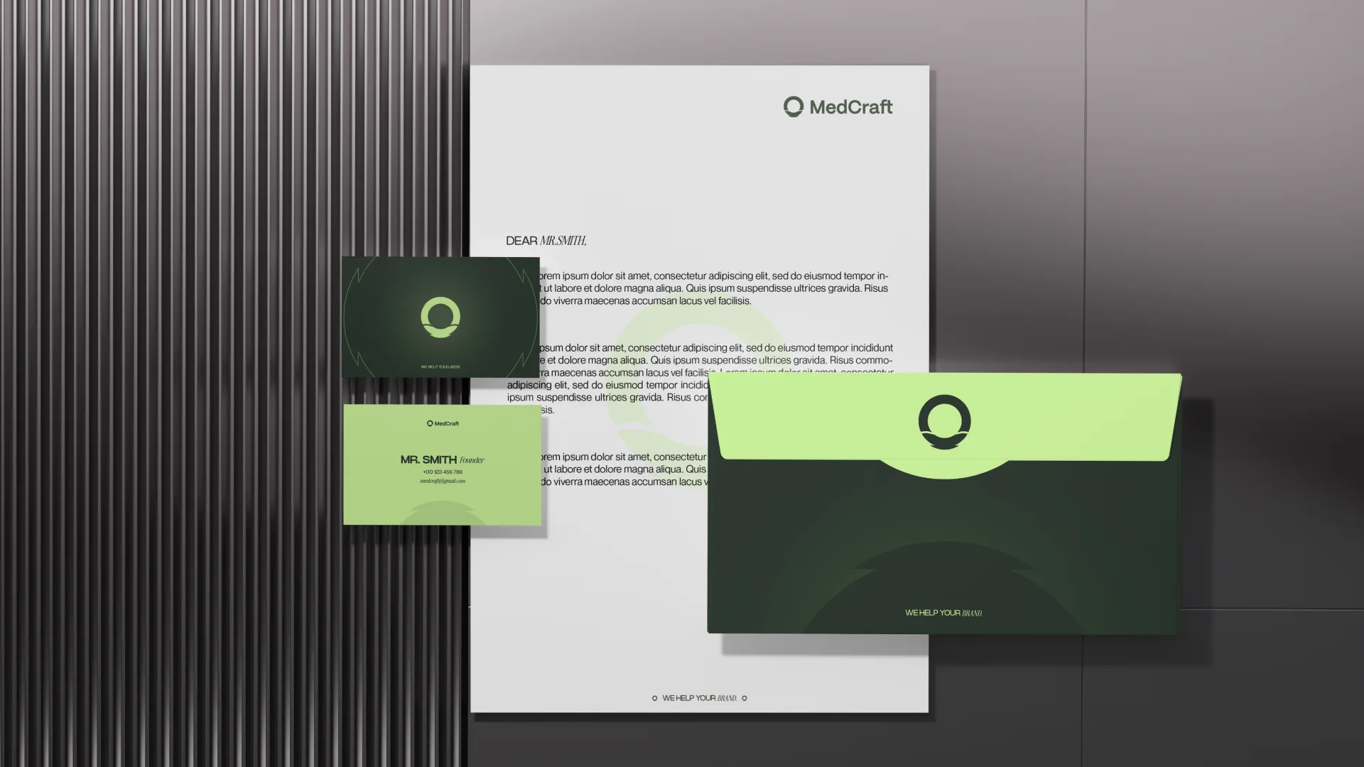 MedCraft stationery set, letterhead, two tone business cards and a lime and green envelope